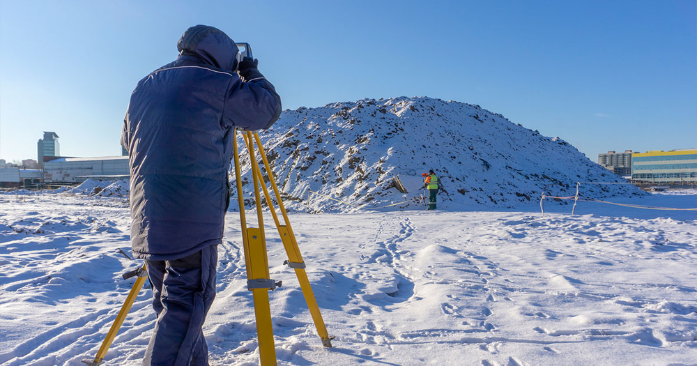 Surveying Winter Construction Site