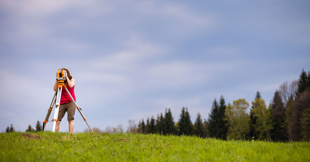 Woman Land Surveying