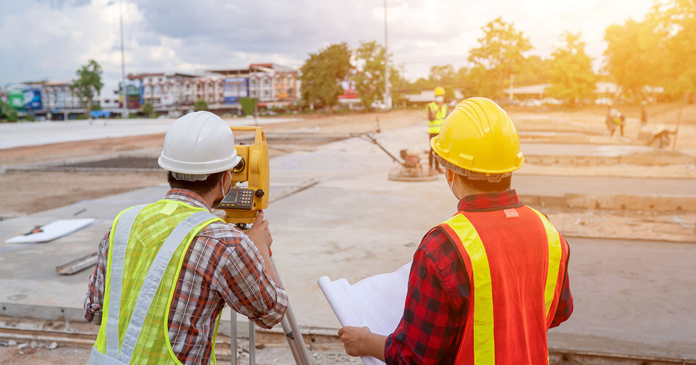 Surveyors on a construction site