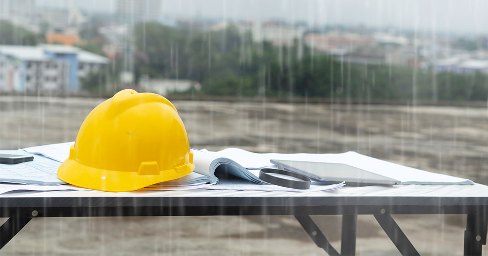 Hard hat in the rain on construction site