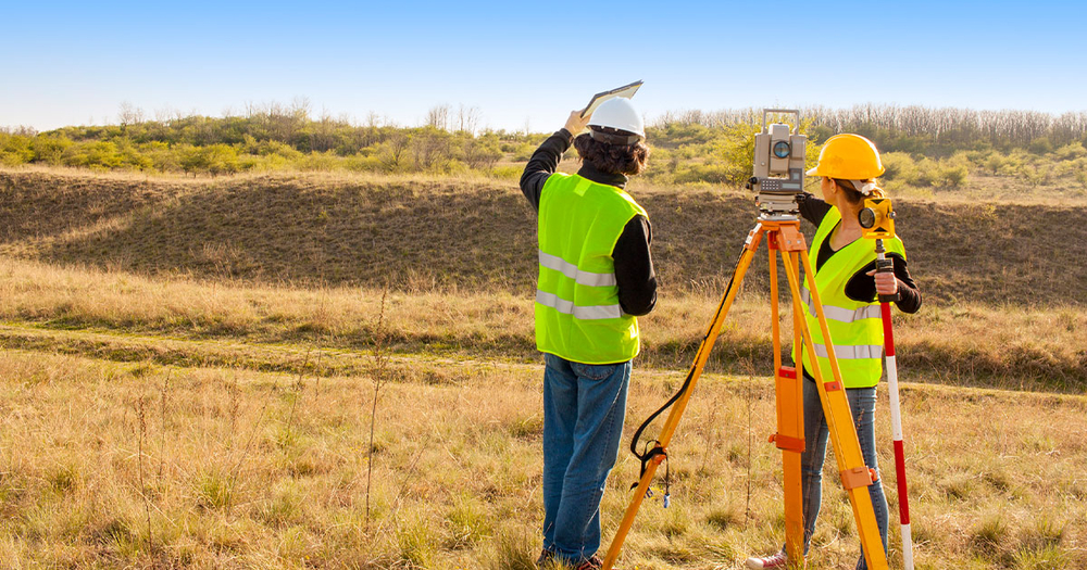 Engineers surveying the land