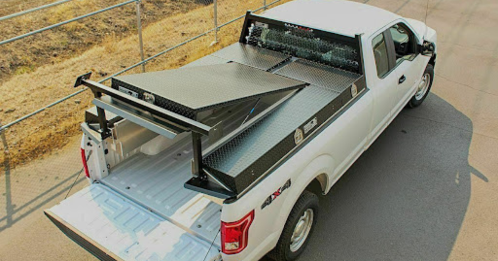 A truck slide from Baseline Equipment Company in a white work truck.