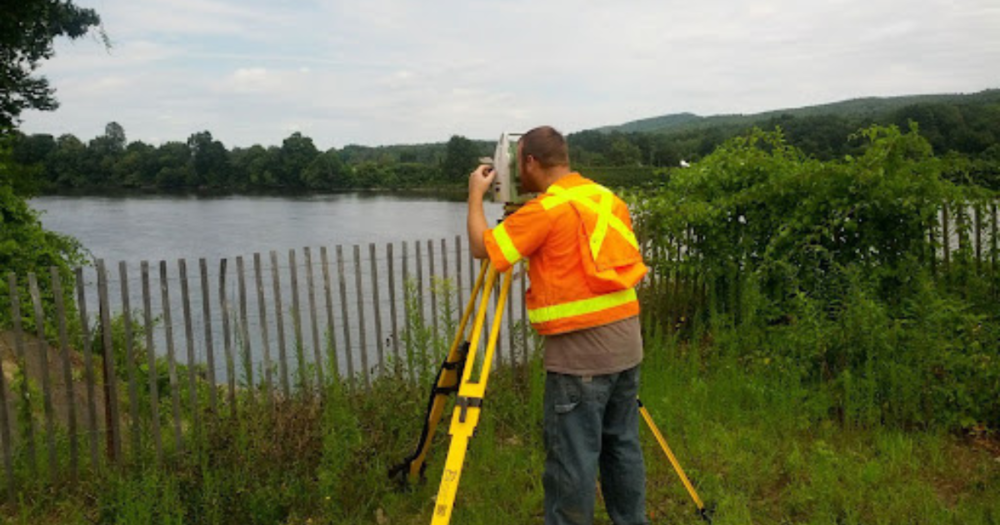 A surveyor using a reflectorless total station.