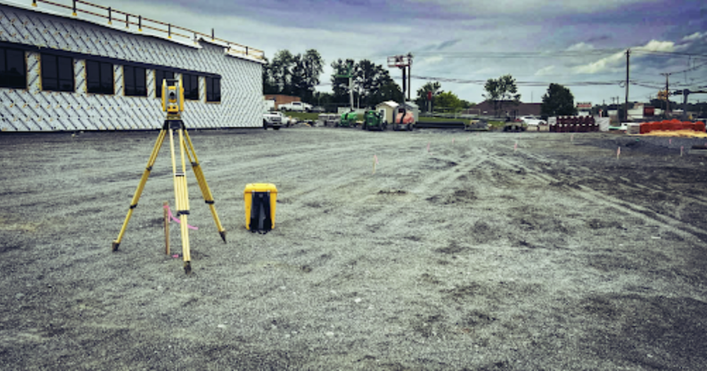 A professional grade total station at a job site.