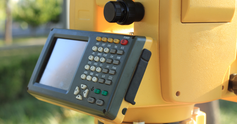 A close up of a keyboard on a total station.